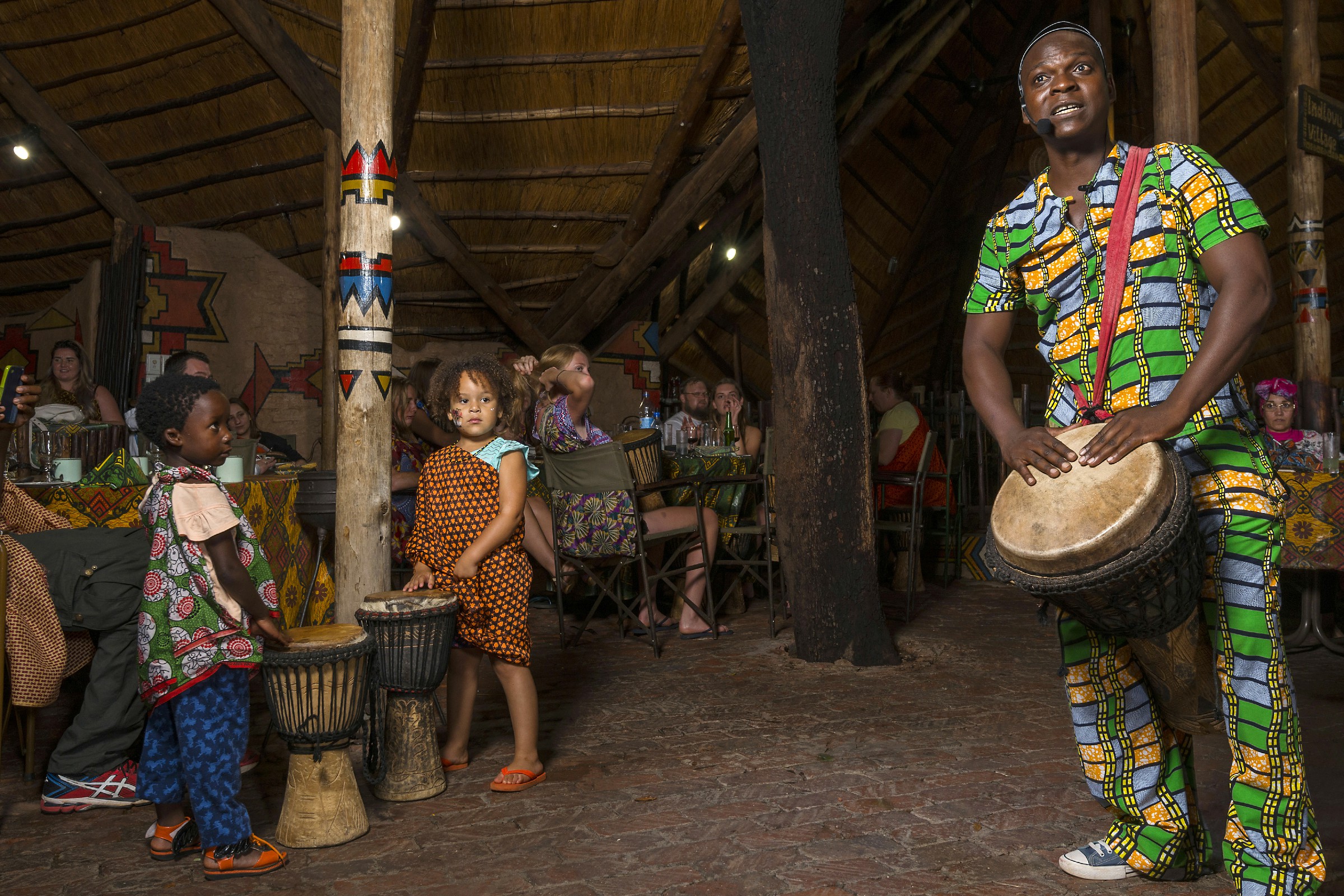 The Boma – Dinner & Drum Show – children drumming